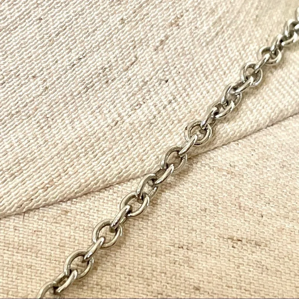 Silver tone disc necklace